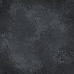 A dark, textured surface showcasing a deep gray, mottled appearance with subtle variations in tone.