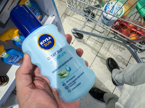 BELGRADE, SERBIA - MAY 3, 2025: Nivea Sun After Sun bottle with Nivea logo. The product emphasizes aftersun skincare, hydration and sunburn relief, Nivea is a german skincare company.