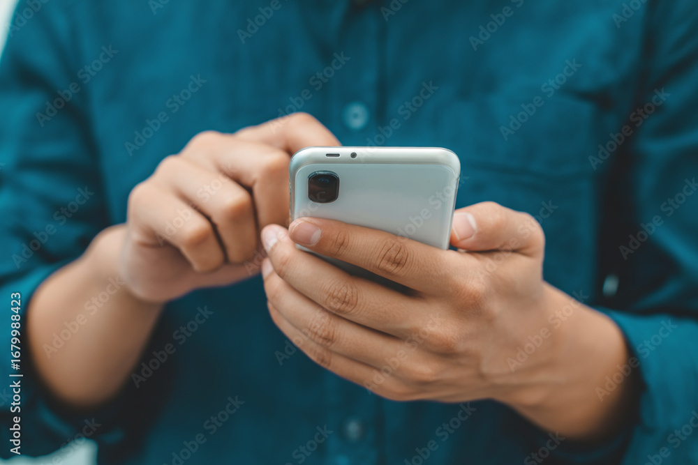 Poster man using smartphone mobile phone for social media texting and communication technology concept imag