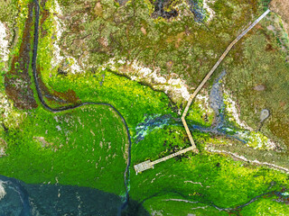 Top Down over River Hamble Mud at low tide from drone, Swanwick, Southampton, Hampshire, England