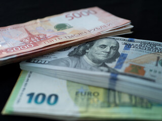 Global Currency Notes: Russian Rubles, US Dollars and Euros