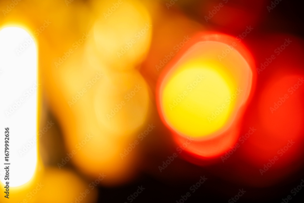 Poster abstract image showing blurred golden and red light with bokeh spheres against a dark background, cr