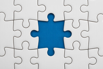 Fototapeta premium Missing puzzle piece concept jigsaw puzzle completion strategy solution problem solving teamwork 99 pieces
