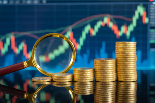 Stock market analysis and investment strategy with coins and magnifying glass for financial growth 100