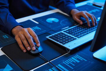 Analyzing financial data on computer for business intelligence and data analytics professional work 100