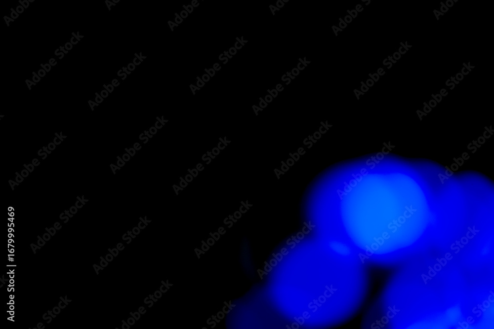 Poster a colorful abstract background featuring blurred light bokeh circles against a dark or black backgro