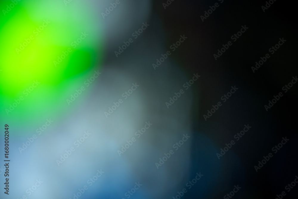 Poster abstract blurred background with a soft color gradient in shades of green, blue, and black. texture 