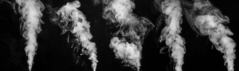 Collection of steam trails isolated on a black background. Diverse fume and vapor textures for...