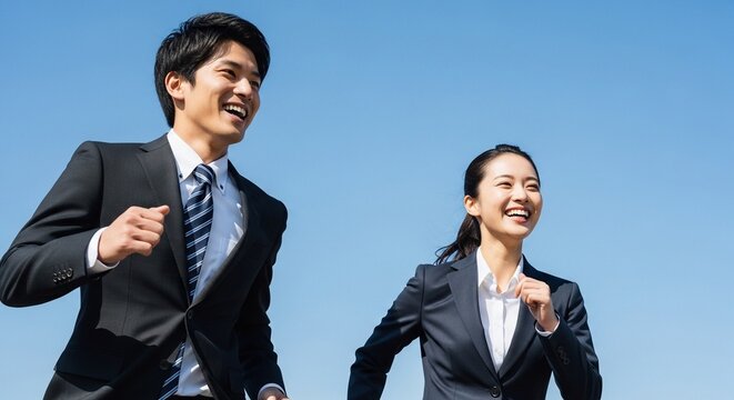 就職活動で未来へ向けて走り出す、リクルートスーツを着用した若者たち