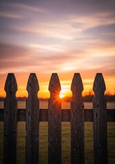 Sunrise through a wooden fence