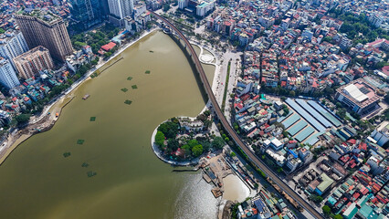 Hoang Cau Lake curves beneath Hanoi metro bridge