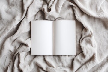 Open notebook on draped linen (1)