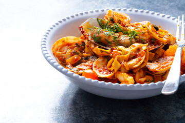 italian seafood pasta in tomato sauce