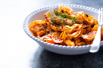 italian seafood pasta in tomato sauce
