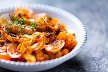 italian seafood pasta in tomato sauce