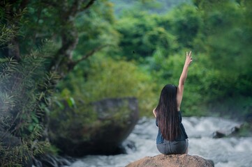 Tranquil Nature Escape with Streams and Waterfalls in Forest Setting