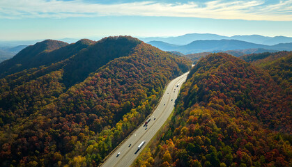 Aerial view of I-40 freeway in North Carolina heading to Asheville through Appalachian mountains in...