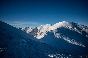 winter mountain peaks at sunrise