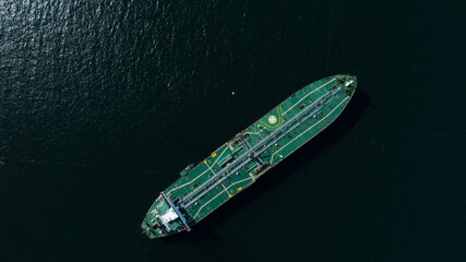 Aerial view crude oil tanker ship at sea, Green crude oil tanker ship top view, Logistic and...