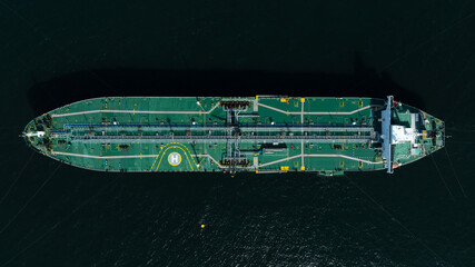 Aerial view crude oil tanker ship at sea, Green crude oil tanker ship top view, Logistic and...