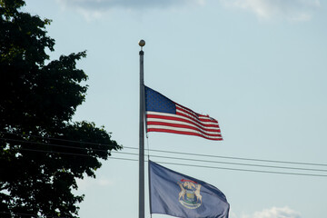 American flag against a blue sky