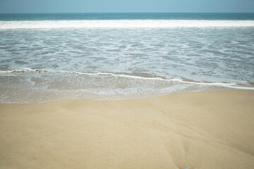 The ocean's endless blue meets the golden sand. A perfect day.