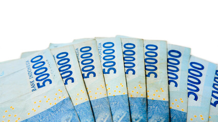 Indonesian Rupiah 50000 Banknotes Fanned on White Background