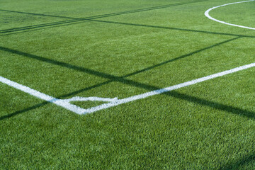 green artificial football or soccer field sport background