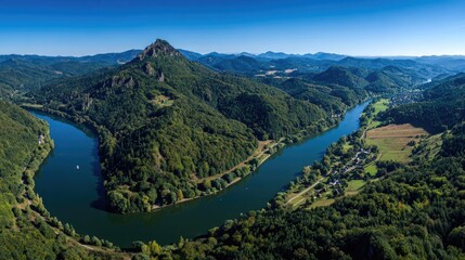 Aerial View Of Meandering River Through Valley Landscape