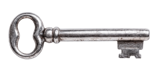 Antique, metallic key with a  decorative, ornate shape