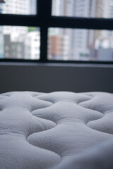 Obraz premium Soft mattress resting in a modern urban bedroom