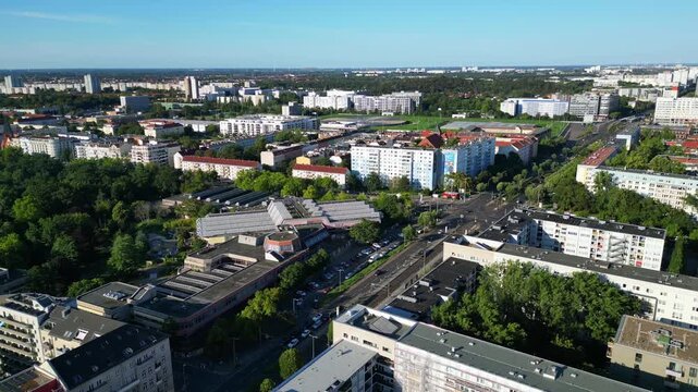 Sez and Volkspark Friedrichshain in Berlin, showcasing its lush greenery, a passing tram on a sunny day. speed ramp hyper motion time lapse Nice aerial view flight panorama orbit drone
