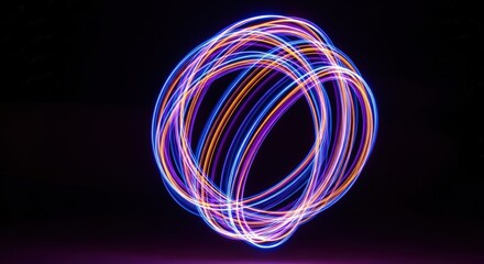 Abstract Glowing Light Trails Forming a Sphere on Black Background