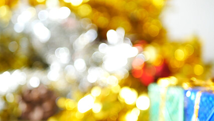Blurred background golden glitter shiny sparkling banner. Happy Holidays background for template on...