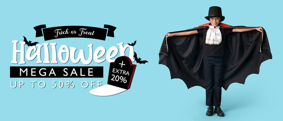 Cute happy African-American boy dressed as Dracula for Halloween party on blue background