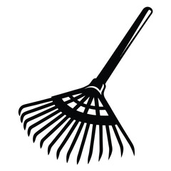 Silhouette of a rake used for gathering leaves and lawn maintenance