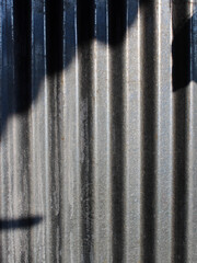 View of zinc roof pattern on a sunny day. 