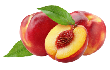 Two ripe nectarines, one halved, with leaves