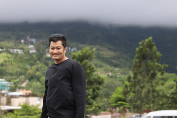 young man in the mountains