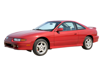 Classic red two door coupe sports car from the 1990s with a sleek design and sporty wheels isolated on transparent background