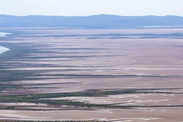 Aerial view of mangroves, the tidal mud flats and marshes near Wyndham in the Kimberley region of...
