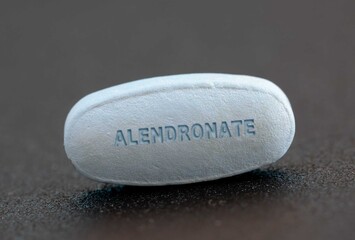 Close-up of Alendronate Bisphosphonate Pill for Osteoporosis Treatment