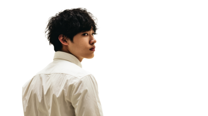 Young Asian man with messy dark hair looking sideways in a white collared shirt, cut out transparent