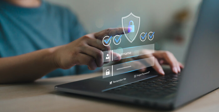 Cybersecurity login with hand typing username and password on laptop, online data protection, security access social media and internet safety technology. Security user access data control concept.