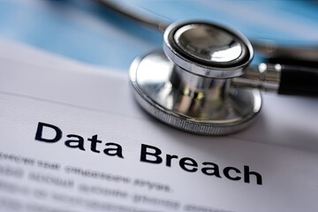Medical document about data breach, with stethoscope