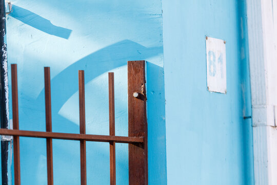 A blue wall with a number 81 on it