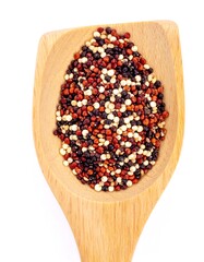 Quinoa in a wooden spoon