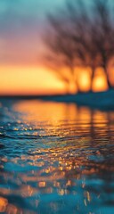 Blurry sunset over water, shallow focus