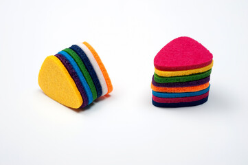 Felt picks in different colors for playing the ukulele or other string instruments.
