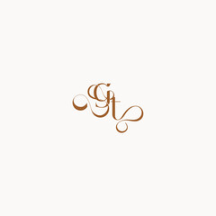caligraphic style monogram luxury minimalist logo design TG wedding initial concept letter